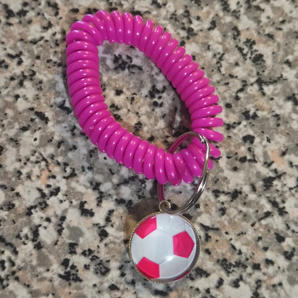 Pink Spiral Keychain with Soccer Ball Charm